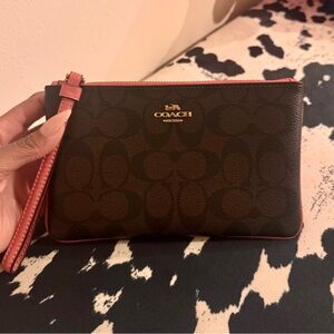 Coach Dark Brown Wristlet with Pink Trim